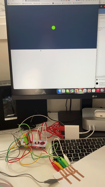 Variation of the the first video. Instead of putting the ground wire on my finger, I placed it on the paper and the pressure from my finger closes the circuit.