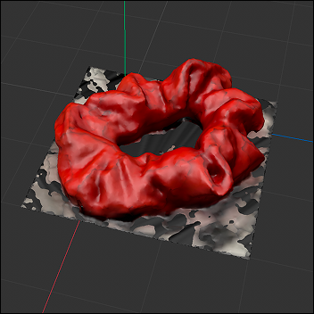 An image of the scrunchie after it was baked. Instead of it's velvet texture, it now looked leathry. I was happy the colours remained the same!